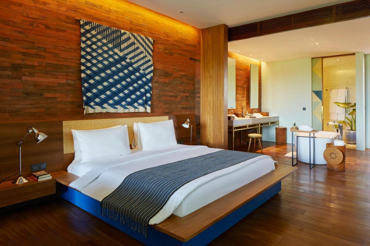 Potato Head Suites&Studios Seminyak Esterno foto A bedroom at the hotel