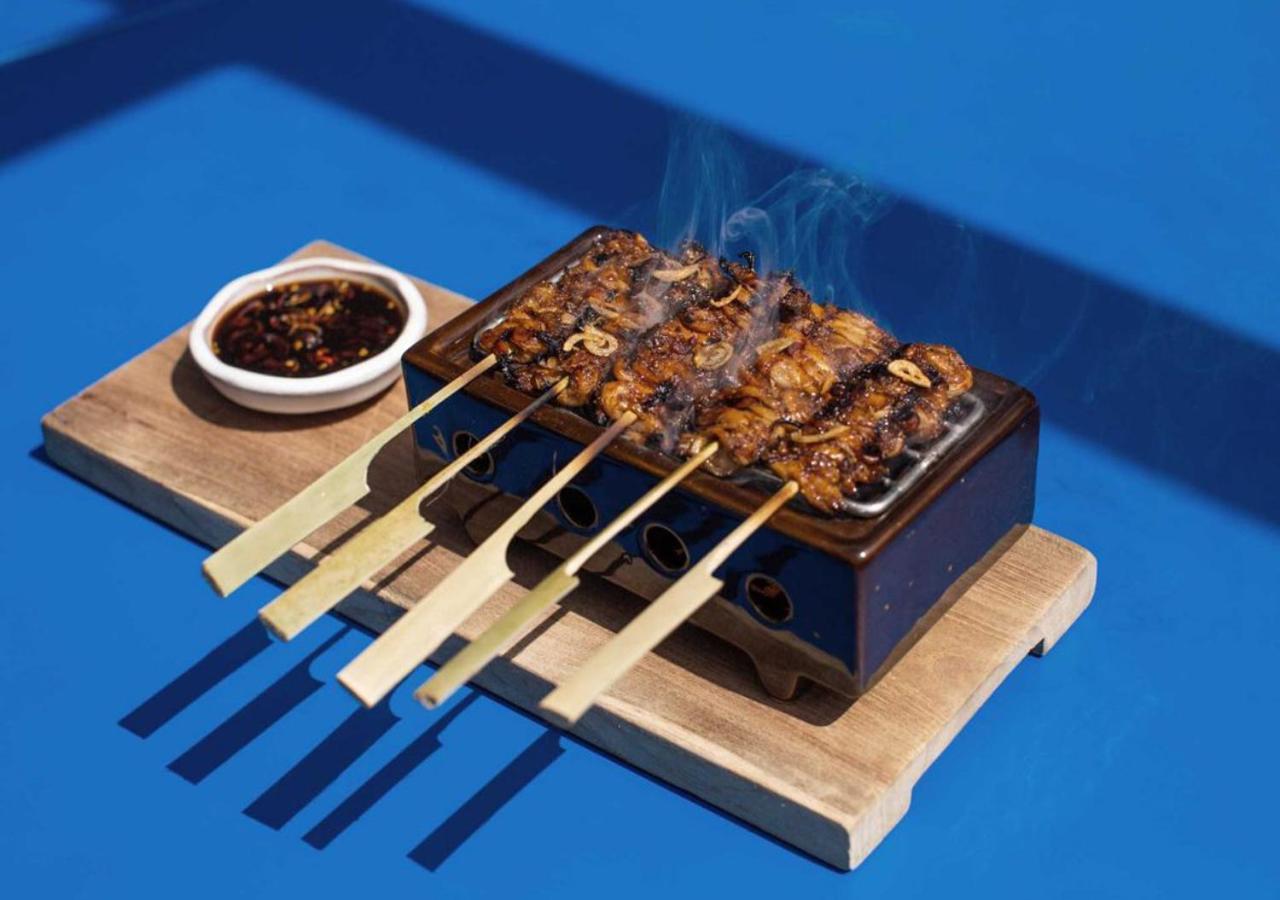 Potato Head Suites&Studios Seminyak Esterno foto A small tabletop grill